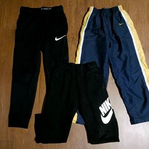 3 pair of Nike pants
